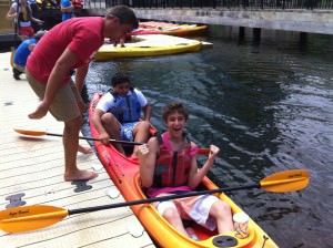 James & Solomon boarding their kayak